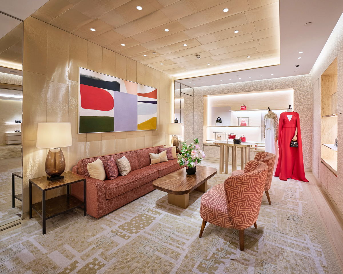 Private client salon with coral sofa and abstract artwork, Louis Vuitton Harrods