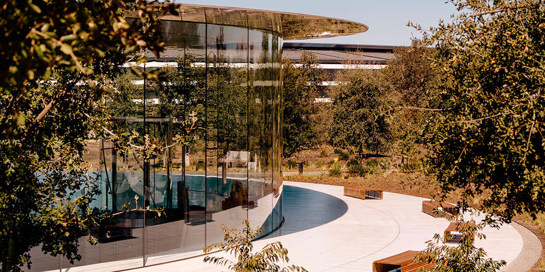 Steve Jobs Theater glass cylinder beneath a disc roof, Apple Park, Cupertino, California