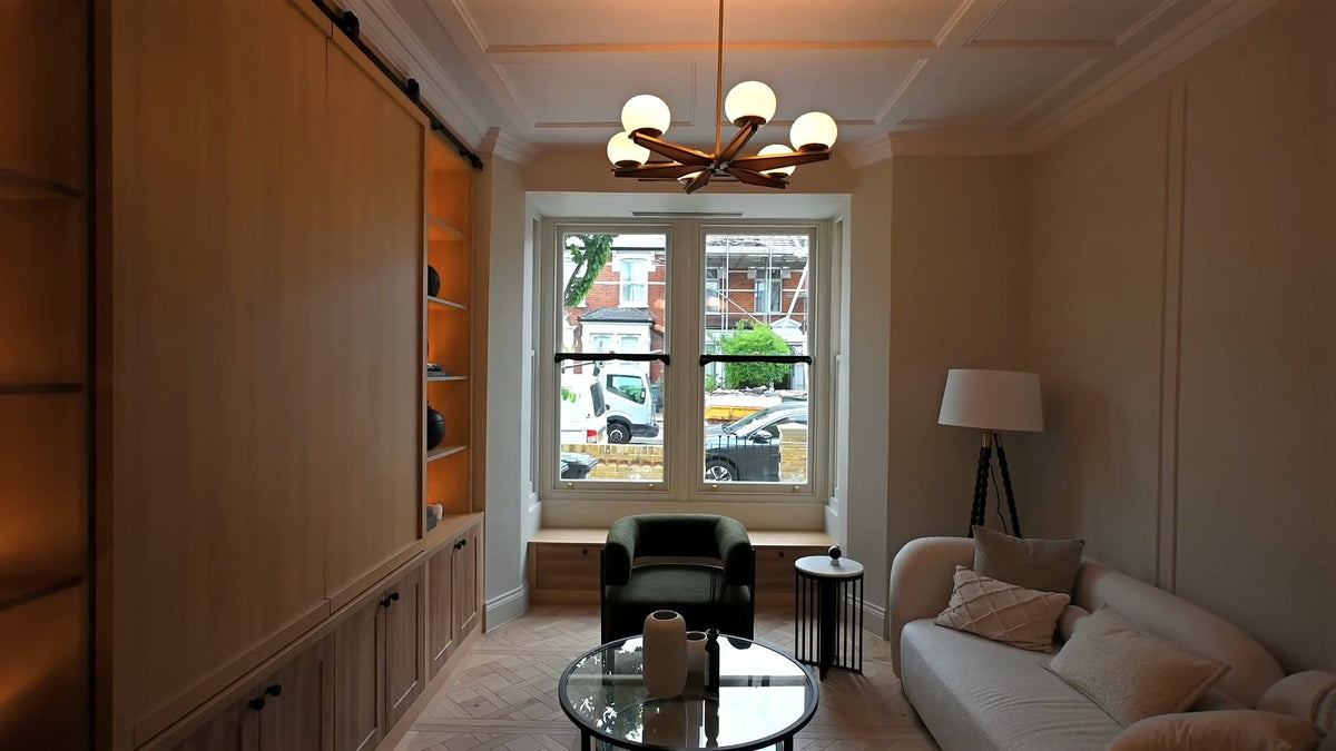 Panelled living room with bay window seating, Finsbury Park home, London